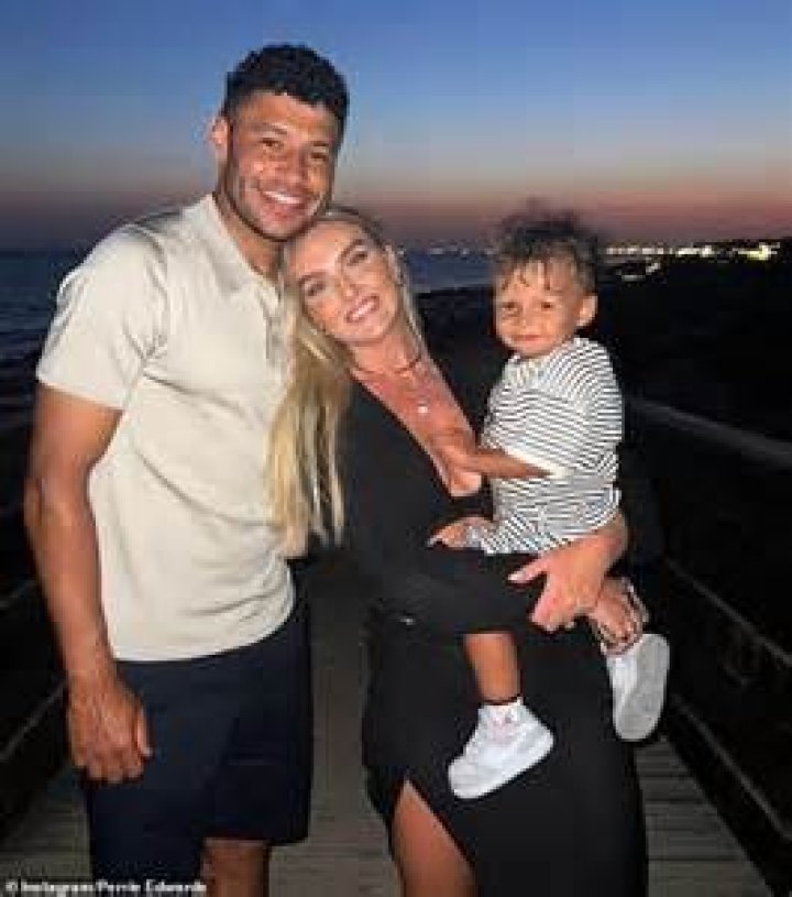 Alex Oxlade-Chamberlain, Perrie Edwards. Alex Oxlade-Chamberlain and Perrie Edwards of Little Mix pose for photographers upon arrival at the Brit Awards in London Brit Awards 2019 Arrivals, London, United Kingdom - 20 Feb 2019