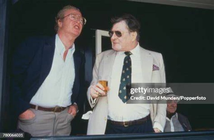 British Actor Michael Caine With His Wife Shakira At Premiere Of The Film That's Entertainment In 1974. British Actor Michael Caine With His Wife Shakira At Premiere Of The Film That's Entertainment In 1974.