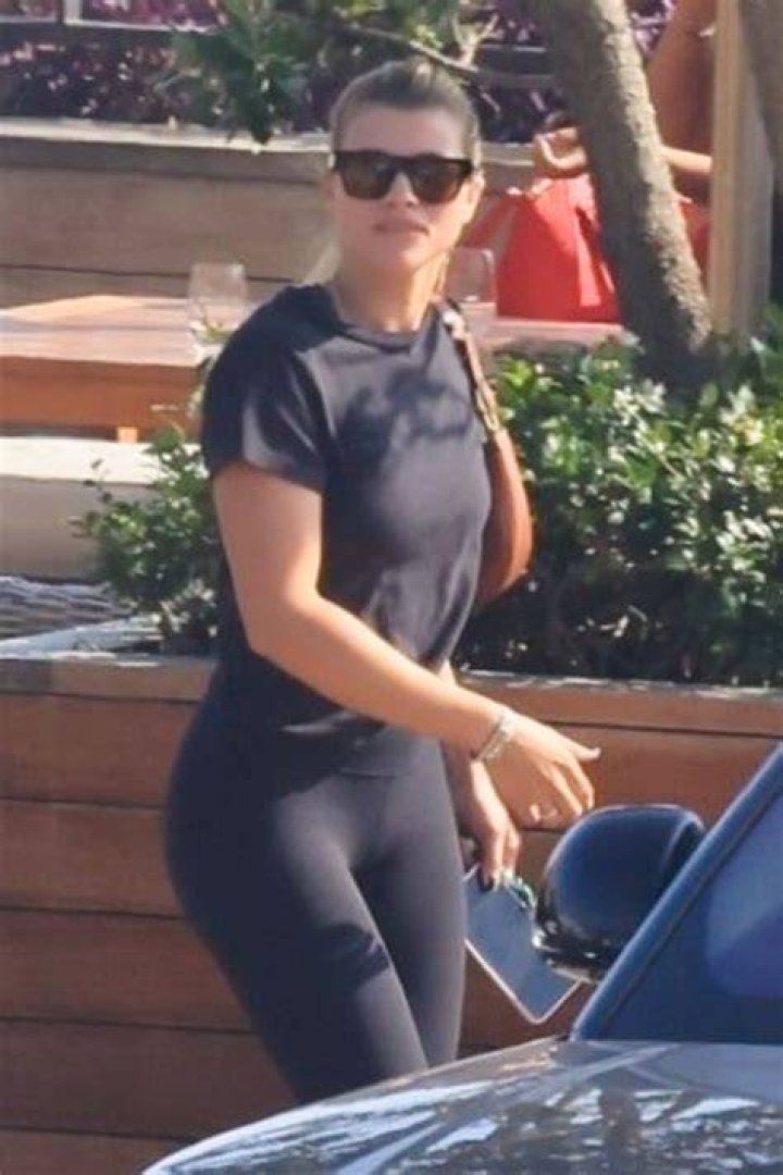 *EXCLUSIVE* Malibu, CA - Sofia Richie holds on tight to Scott Disick as they have some fun riding a motorbike on the beach in Malibu during the COVID-19 safer at home order. *Shot on April 22, 2020* Pictured: Sofia Richie, Scott Disick BACKGRID USA 24 APRIL 2020 BYLINE MUST READ: RMBI / BACKGRID USA: +1 310 798 9111 / UK: +44 208 344 2007 / *UK Clients - Pictures Containing Children Please Pixelate Face Prior To Publication*
