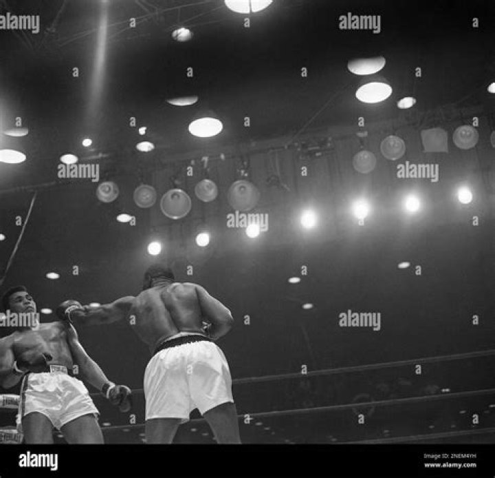 Muhammad Ali (Cassius Clay) the windy young heavyweight from Louisville, Ky., shadow boxes on in the final stages of his preparations to fight Archie Moore in the Los Angeles Sports Arena November 15. A superb physical specimen, the undefeated Clay says ?That old man will never catch me Muhammad Ali, Los Angeles, USA