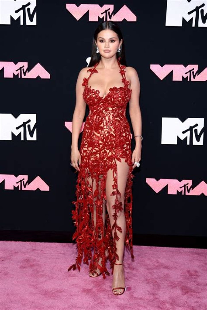 Selena Gomez Poses In Red bikini