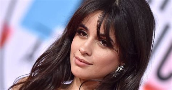 Singer Camila Cabello shows off her curves in a yellow animal print bikini in Miami Beach, Florida. 02 Apr 2022 Pictured: Camila Cabello. Photo credit: MEGA TheMegaAgency.com +1 888 505 6342 (Mega Agency TagID: MEGA844099_002.jpg) [Photo via Mega Agency]