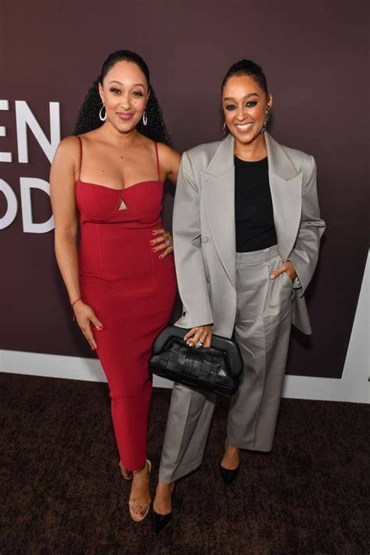 Tamera Mowry, left, and Tia Mowry arrive at the Teen Choice Awards at the Gibson Amphitheater, in Los Angeles 2013 Teen Choice Awards - Arrivals, Los Angeles, USA - 11 Aug 2013