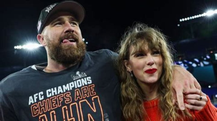 Travis Kelce and Taylor Swift kissing at the 2024 Super Bowl